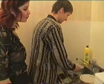 Russian Mother And Dude In Kitchen