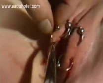 Sir Puts Iron Rings Thru Victim Her Gash Lips While A Other Victim Gets Gigantic Iron Needles